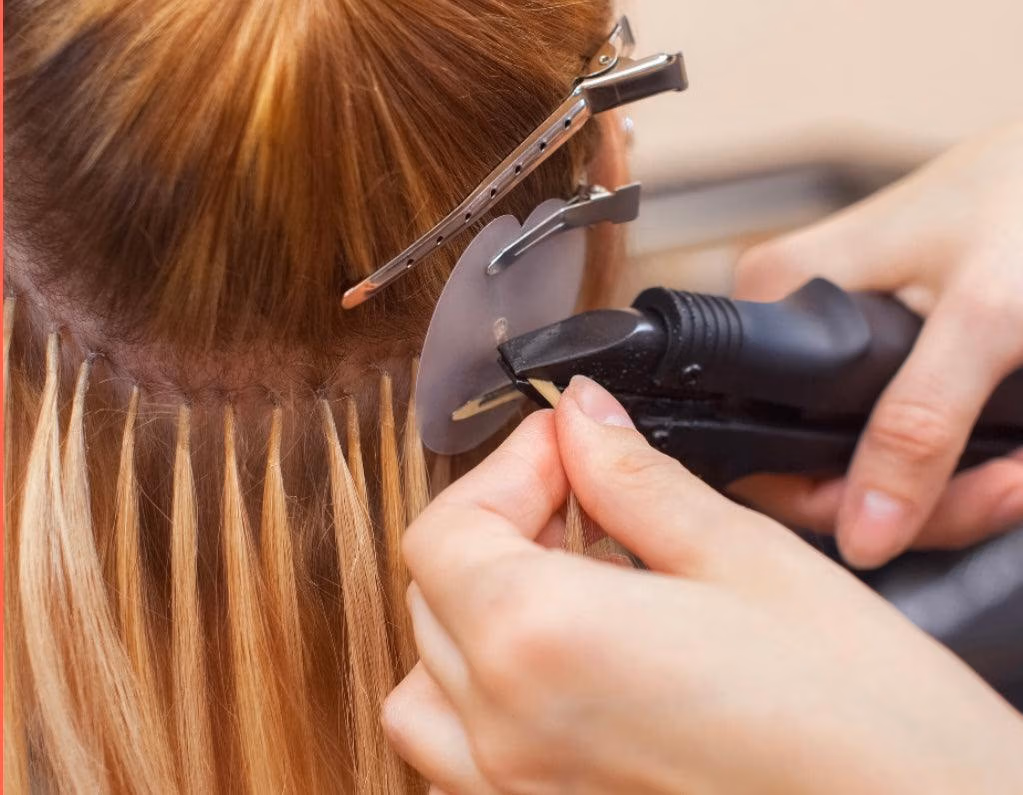 Applying hair extensions using keratin tips